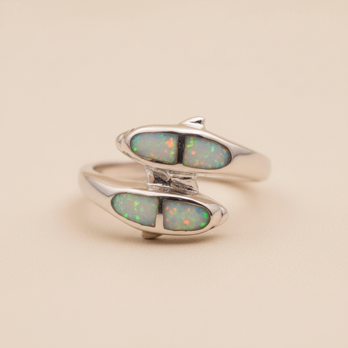Anillo Delfín frontal fondo beige