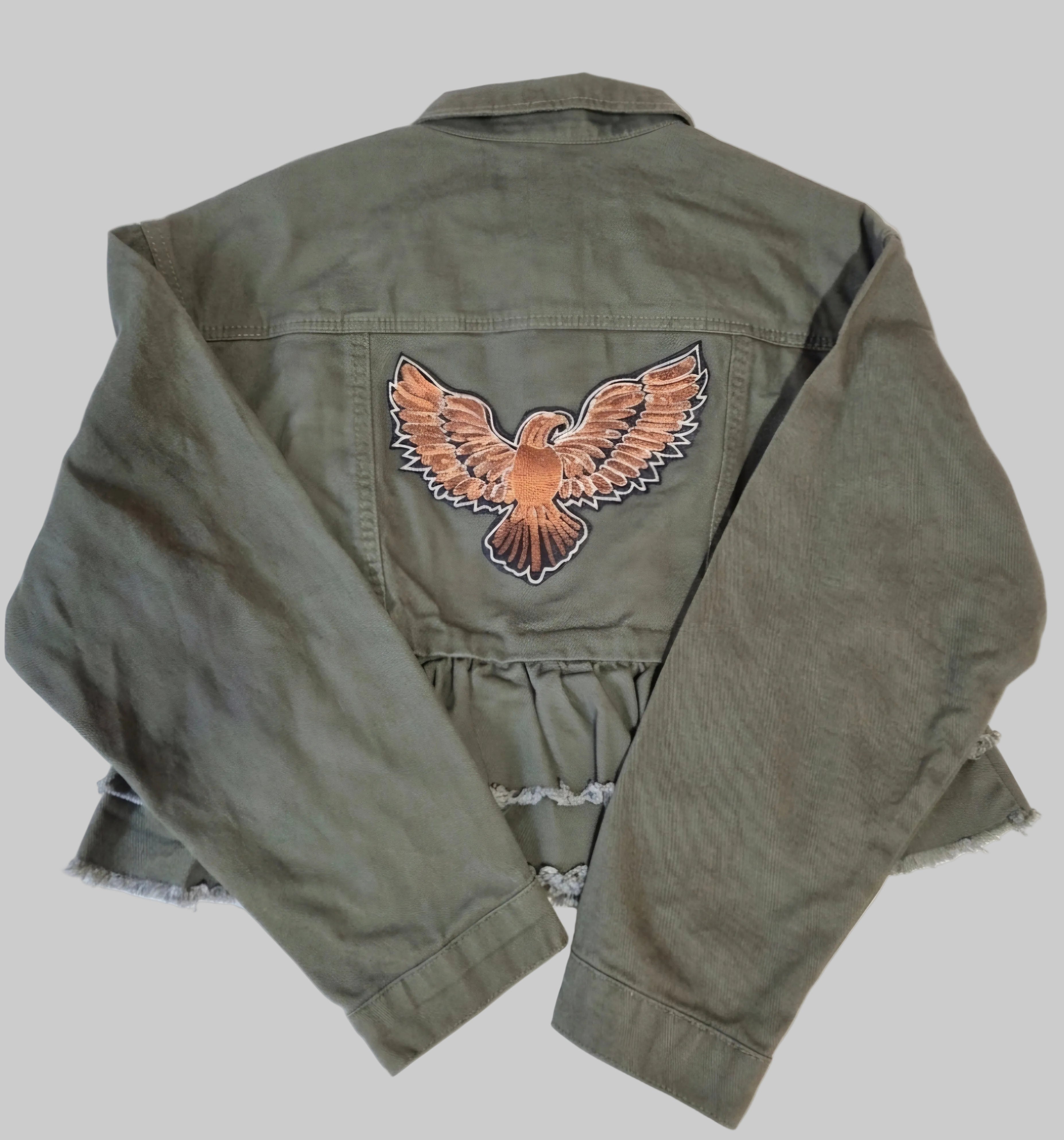 Vista lateral chaqueta denim Águila Imperial artesanal vintage | vaqueraspain