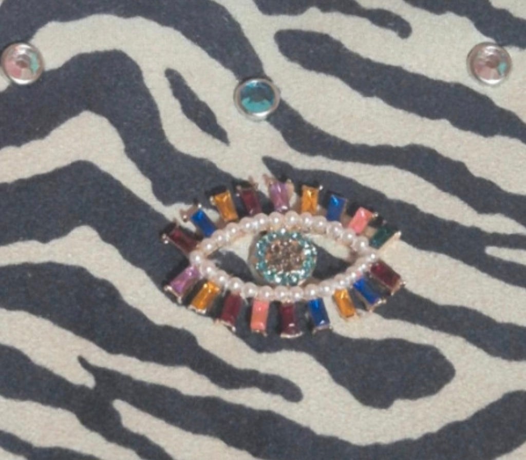 Vista frontal bolso hobo zebra y ojo místico boho chic | vaqueraspain