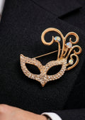 Broche elegante mascara de carnaval dorada