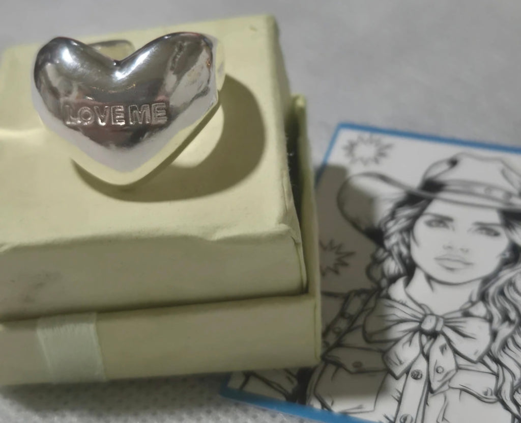 Vista lateral anillo LOVE ME puffy plata 925 vintage | vaqueraspain
