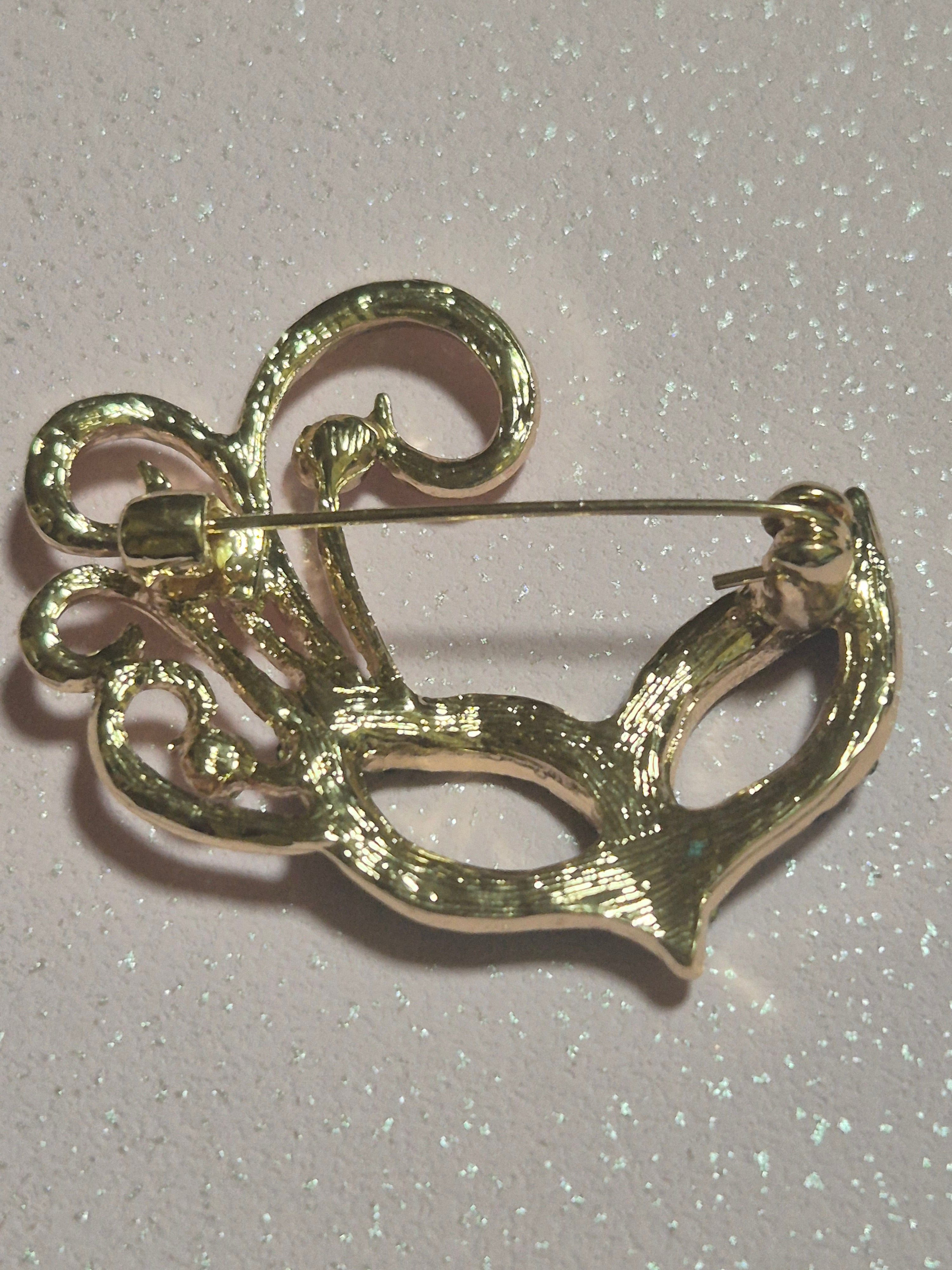 Broche máscara de antifaz de estilo veneciano azul turquesa