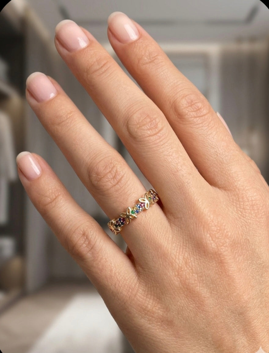 Anillo gold filled 14 K" mariposas caladas con strass colores."