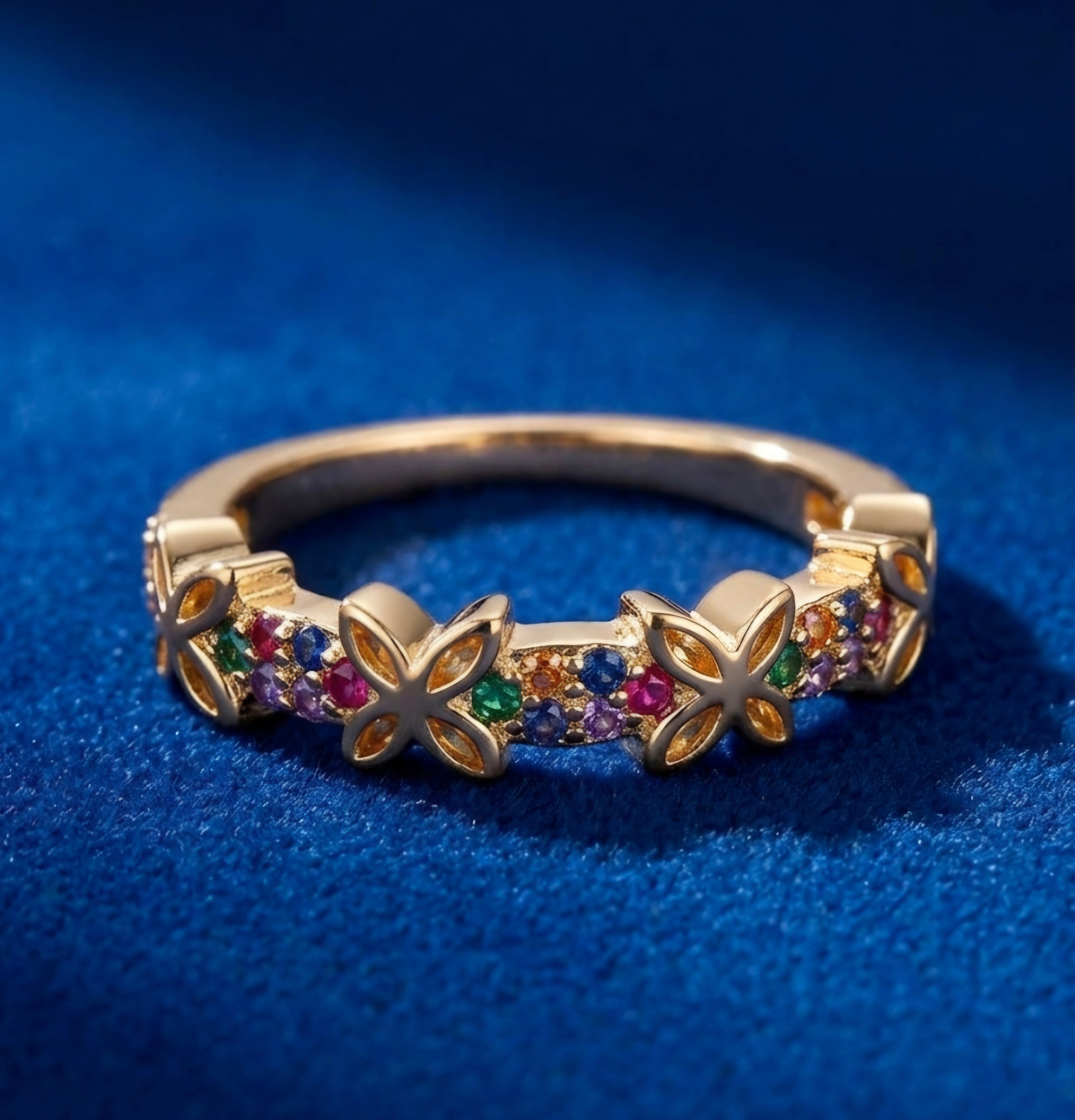 Anillo gold filled 14 K" mariposas caladas con strass colores."