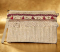 Bolso boho chic con pasamaneria granate y borlas