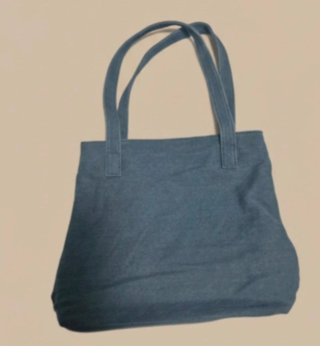 Bolso tote vaquero pompones estrellas detalle decorativo - vaqueraspain