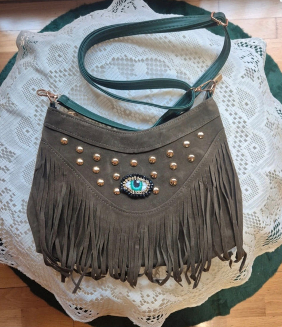 Bolso bohemio verde caqui flecos detalle parche ojo - vaqueraspain