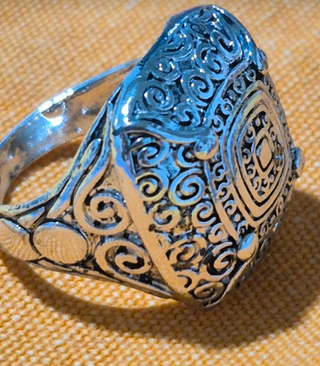 Vista frontal anillo bohemio volutas espirales acero baño rodio | vaqueraspain
