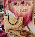Bolso clutch bohemio con adorno semicircular bolitas de colores