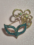 Broche máscara de antifaz de estilo veneciano azul turquesa